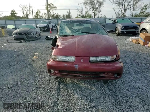 1999 Saturn SL z VIN 1G8ZK5278XZ173810, wystawiony jako Copart lot #42571425 z przebiegiem 114 580 mil mil oraz Szkoda całkowita • Salvage title. Historia ofert i sprzedaży dostępna na DreamBid. Obrazek 10.