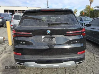 2025 BMW X5 sDrive40i with VIN 5UX13EU04S9Y27497, listed as a Copart auction lot 47147515 with 1,735 mi miles and Clean Title. Bid and sale history available at carsss.com. Image 6.
