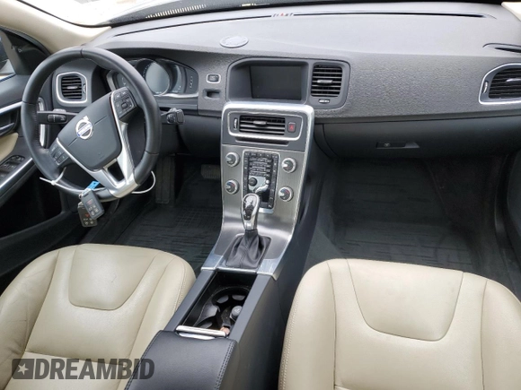 2016 Volvo S60 T5 Drive-E Premier z VIN YV126MFK5G2412365, wystawiony jako Copart lot #51577155 z przebiegiem 59 319 mil mil oraz Szkoda całkowita • Salvage title. Historia ofert i sprzedaży dostępna na DreamBid. Obrazek 8.