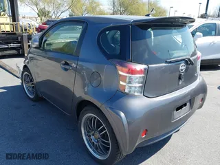 2012 Scion iQ with VIN JTNJJXB07CJ017296, listed as a IAAI auction lot 41636769 with 94,333 mi miles. Bid and sale history available at carsss.com. Image 3.