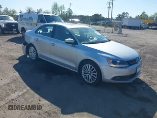 2014 Volkswagen Jetta TDI w/Premium with VIN 3VWLL7AJ2EM359341, listed as a IAAI auction lot 42030959 with 74,273 mi miles and . Bid and sale history available at DreamBid. Image 1.