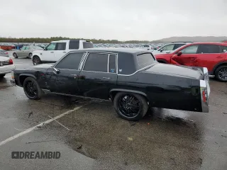 1989 Cadillac Brougham z VIN 1G6DW51Y9KR725809, wystawiony jako Copart lot #80902764 z przebiegiem 56 033 mil mil oraz Szkody całkowita. Historia ofert i sprzedaży dostępna na DreamBid. Obrazek 2.
