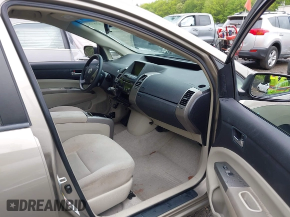 2007 Toyota Prius z VIN JTDKB20U377590729, wystawiony jako IAAI lot #42187283 z przebiegiem 156 047 mil mil oraz . Historia ofert i sprzedaży dostępna na DreamBid. Obrazek 5.