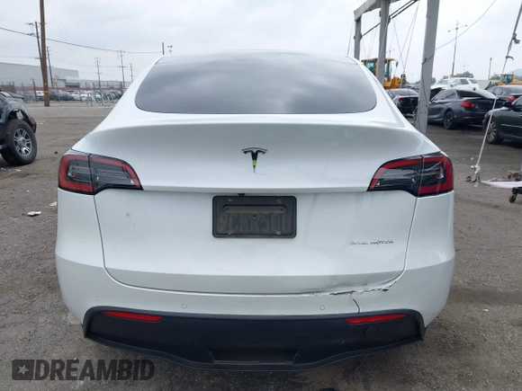 2022 Tesla Model Y Long Range with VIN 7SAYGDEE3NF518061, listed as a IAAI auction lot 41896233 with 34,714 mi miles and . Bid and sale history available at carsss.com. Image 16.