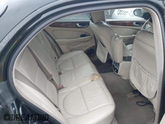 2004 Jaguar XJ with VIN SAJEA71C34SG10171, listed as a IAAI auction lot 41412081 with 150,488 mi miles. Bid and sale history available at carsss.com. Image 8.