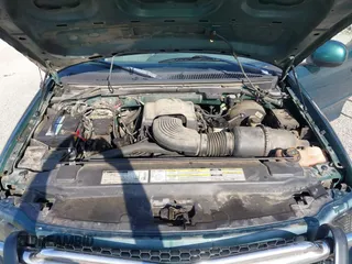 1999 Ford F-150 with VIN 1FTRX18W4XNA50527, listed as a IAAI auction lot 42563746 with 213,959 mi miles and . Bid and sale history available at DreamBid. Image 10.