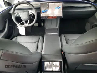 2025 Tesla Model 3 Long Range with VIN 5YJ3E1EA7SF889678, listed as a Copart auction lot 42952045 with 521 mi miles and Salvage Title. Bid and sale history available at DreamBid. Image 8.