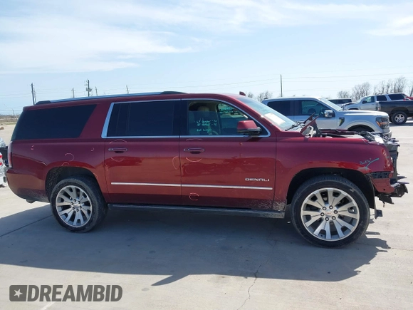 2020 GMC Yukon XL Denali with VIN 1GKS1HKJ3LR238701, listed as a IAAI auction lot 41724274 with 107,323 mi miles and . Bid and sale history available at DreamBid. Image 13.
