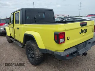 2023 Jeep Gladiator Sport S with VIN 1C6HJTAG1PL576760, listed as a IAAI auction lot 42106618 with 24,738 mi miles and . Bid and sale history available at DreamBid. Image 3.