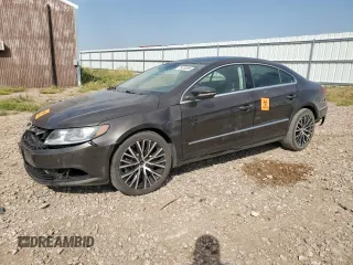2014 Volkswagen CC VR6 Executive 4Motion with VIN WVWGU7AN9EE523145, listed as a Copart auction lot 71419134 with 94,547 mi miles and Salvage Title. Bid and sale history available at carsss.com. Image 1.