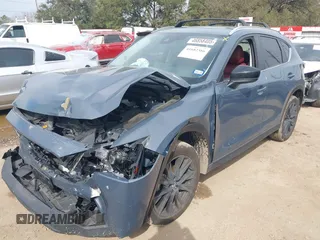 2023 Mazda CX-5 S Carbon Edition z VIN JM3KFBCM6P0288402, wystawiony jako IAAI lot #41682386 z przebiegiem 30 482 mil mil oraz . Historia ofert i sprzedaży dostępna na DreamBid. Obrazek 17.