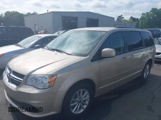 2014 Dodge Grand Caravan SXT z VIN 2C4RDGCG6ER162533, wystawiony jako IAAI lot #42251591 z przebiegiem 70 666 mil mil oraz . Historia ofert i sprzedaży dostępna na DreamBid. Obrazek 2.