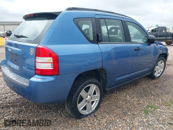 2007 Jeep Compass Sport with VIN 1J8FT47W57D215243, listed as a IAAI auction lot 41925203 with 255,193 mi miles. Bid and sale history available at carsss.com. Image 4.