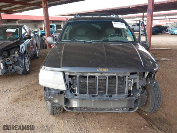 2004 Jeep Grand Cherokee Laredo with VIN 1J4GX48N64C436853, listed as a IAAI auction lot 41785918 with 118,578 mi miles. Bid and sale history available at carsss.com. Image 11.