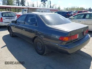 2001 Toyota Camry CE with VIN JT2BG22K410566882, listed as a IAAI auction lot 42084098 with 1 mi miles. Bid and sale history available at carsss.com. Image 3.