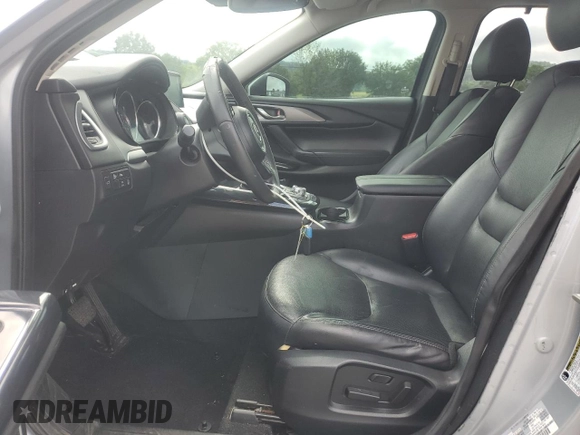 2017 Mazda CX-9 Touring with VIN JM3TCACY8H0135810, listed as a Copart auction lot 61651495 with 67,305 mi miles and Salvage title. Bid and sale history available at DreamBid. Image 7.
