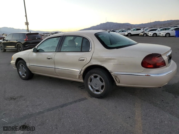 2000 Lincoln Continental with VIN 1LNHM97V0YY807253, listed as a Copart auction lot 80661834 with 130,398 mi miles and Salvage Title. Bid and sale history available at carsss.com. Image 2.