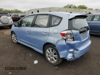 2009 Honda Fit Sport z VIN JHMGE88619S045049, wystawiony jako Copart lot #54223135 z przebiegiem 107 601 mil mil oraz Szkoda całkowita • Salvage title. Historia ofert i sprzedaży dostępna na DreamBid. Obrazek 2.