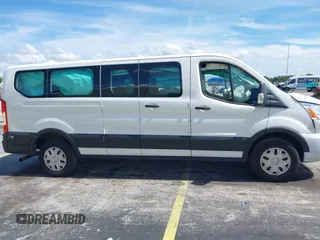 2020 Ford Transit Passenger XL with VIN 1FBAX2Y80LKA42137, listed as a IAAI auction lot 42802902 with 59,540 mi miles and . Bid and sale history available at DreamBid. Image 14.
