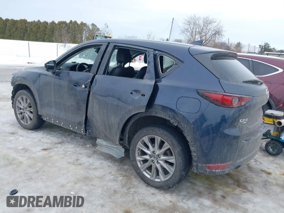 2020 Mazda CX-5 Grand Touring with VIN JM3KFBDM9L0778812, listed as a IAAI auction lot 41589208 with 39,385 mi miles. Bid and sale history available at carsss.com. Image 3.