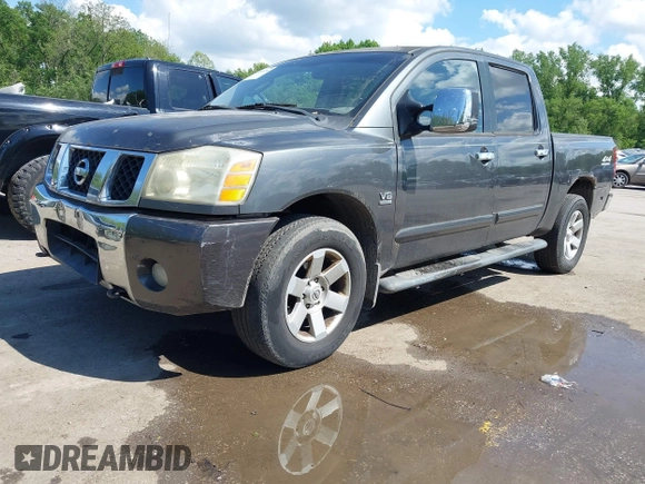 2004 Nissan Titan LE with VIN 1N6AA07B04N525607, listed as a IAAI auction lot 42180184 with 267,589 mi miles. Bid and sale history available at carsss.com. Image 2.
