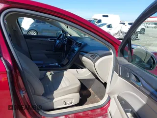 2018 Ford Fusion Hybrid SE with VIN 3FA6P0LU1JR243022, listed as a IAAI auction lot 41470052 with 119,636 mi miles. Bid and sale history available at carsss.com. Image 5.