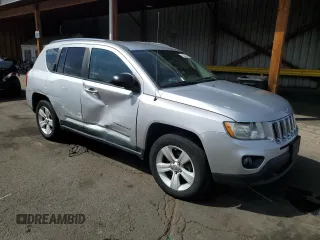 2011 Jeep Compass Latitude with VIN 1J4NF1FB6BD263831, listed as a Copart auction lot 52542625 with 160,743 mi miles and Salvage Title. Bid and sale history available at DreamBid. Image 4.