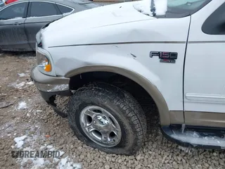 2002 Ford F-150 XLT with VIN 1FTRW08L12KA67332, listed as a IAAI auction lot 41617397 with 41,099 mi miles. Bid and sale history available at carsss.com. Image 6.