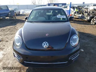 2017 Volkswagen Beetle 1.8T SE with VIN 3VWJ17AT4HM615420, listed as a Copart auction lot 40380154 with 98,746 mi miles and Clean Title. Bid and sale history available at carsss.com. Image 5.