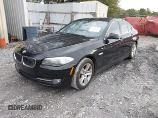 2012 BMW 5 Series 528i with VIN WBAXG5C51CDY28325, listed as a IAAI auction lot 41348221 with 125,039 mi miles. Bid and sale history available at carsss.com. Image 2.