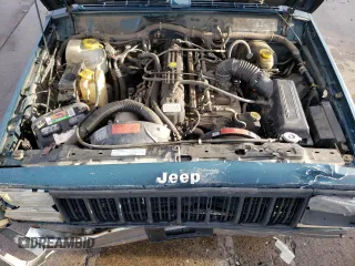 1996 Jeep Cherokee SE z VIN 1J4FJ28S6TL184205, wystawiony jako Copart lot #77558034 z przebiegiem 195 000 mil mil oraz Tytuł czysty. Historia ofert i sprzedaży dostępna na DreamBid. Obrazek 12.