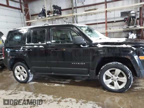 2014 Jeep Patriot Limited with VIN 1C4NJRCB8ED910340, listed as a IAAI auction lot 41396065 with 241,669 mi miles. Bid and sale history available at carsss.com. Image 13.