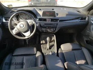 2018 BMW X1 xDrive28i with VIN WBXHT3C33J5K31838, listed as a Copart auction lot 48650943 with 63,064 mi miles. Bid and sale history available at carsss.com. Image 8.