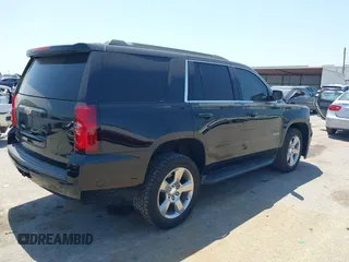 2020 Chevrolet Tahoe LS with VIN 1GNSCAKCXLR293278, listed as a IAAI auction lot 41973191 with 61,907 mi miles and . Bid and sale history available at DreamBid. Image 4.