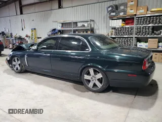 2008 Jaguar XJ Vanden Plas with VIN SAJWA82B98SH23225, listed as a Copart auction lot 73074654 with 162,900 mi miles and Salvage Title. Bid and sale history available at carsss.com. Image 2.