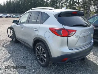 2016 Mazda CX-5 Grand Touring with VIN JM3KE4DYXG0647802, listed as a IAAI auction lot 41996854 with 85,774 mi miles. Bid and sale history available at carsss.com. Image 3.