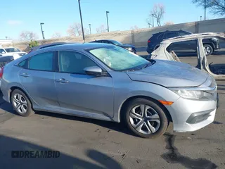 2018 Honda Civic LX with VIN 2HGFC2F58JH571072, listed as a IAAI auction lot 41684450 with 66,032 mi miles and . Bid and sale history available at carsss.com. Image 13.