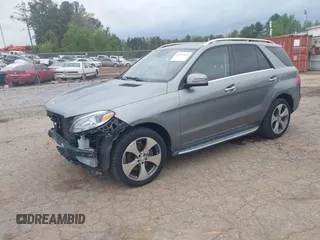 2016 Mercedes-Benz GLE 350 with VIN 4JGDA5JB8GA742920, listed as a IAAI auction lot 41957662 with 99,896 mi miles and . Bid and sale history available at DreamBid. Image 20.