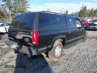 1999 GMC Suburban z VIN 3GKFK16R2XG524342, wystawiony jako IAAI lot #41682292 z przebiegiem 161 536 mil mil oraz . Historia ofert i sprzedaży dostępna na DreamBid. Obrazek 4.