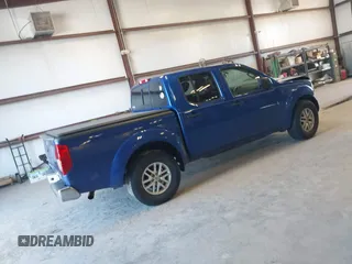2014 Nissan Frontier SV with VIN 1N6AD0ER0EN766382, listed as a IAAI auction lot 41687781 with 143,804 mi miles and . Bid and sale history available at DreamBid. Image 4.