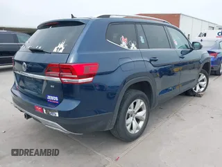 2018 Volkswagen Atlas SE z VIN 1V2KR2CA4JC532476, wystawiony jako IAAI lot #42070722 z przebiegiem 155 320 mil mil oraz . Historia ofert i sprzedaży dostępna na DreamBid. Obrazek 4.