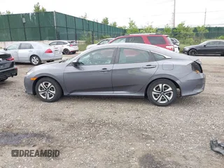 2017 Honda Civic LX z VIN 2HGFC2F54HH527421, wystawiony jako IAAI lot #42329336 z przebiegiem 97 655 mil mil oraz . Historia ofert i sprzedaży dostępna na DreamBid. Obrazek 14.
