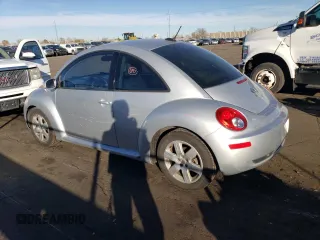 2007 Volkswagen New Beetle Coupe with VIN 3VWEW31C57M508502, listed as a Copart auction lot 82336004 with 58,533 mi miles and Salvage Title. Bid and sale history available at carsss.com. Image 2.