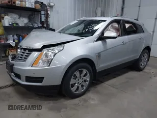 2014 Cadillac SRX Luxury Collection z VIN 3GYFNEE36ES679505, wystawiony jako IAAI lot #41817608 z przebiegiem 62 351 mil mil oraz . Historia ofert i sprzedaży dostępna na DreamBid. Obrazek 2.