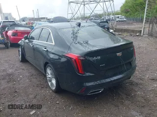 2023 Cadillac CT4 Premium Luxury z VIN 1G6DF5RK5P0109147, wystawiony jako IAAI lot #42124505 z przebiegiem 13 797 mil mil oraz . Historia ofert i sprzedaży dostępna na DreamBid. Obrazek 3.