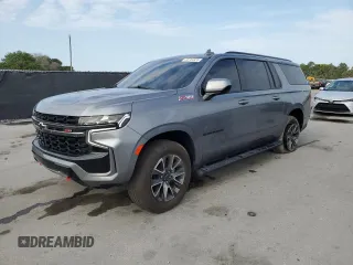 2021 Chevrolet Suburban Z71 z VIN 1GNSKDKD9MR385447, wystawiony jako Copart lot #55764935 z przebiegiem 74 241 mil mil oraz Szkoda całkowita • Salvage title. Historia ofert i sprzedaży dostępna na DreamBid. Obrazek 1.