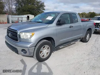 2010 Toyota Tundra 2WD Truck with VIN 5TFRU5F13AX024097, listed as a IAAI auction lot 41473230 with 196,411 mi miles. Bid and sale history available at carsss.com. Image 2.