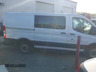 2018 Ford Transit with VIN 1FTYE1YM8JKB52082, listed as a IAAI auction lot 42098033 with 243,181 mi miles. Bid and sale history available at carsss.com. Image 13.
