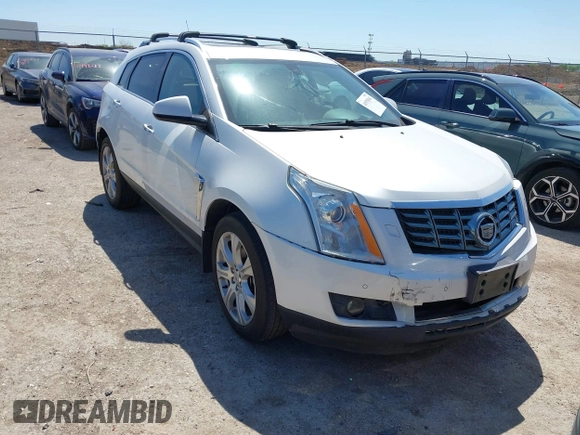 2014 Cadillac SRX Performance Collection with VIN 3GYFNFE35ES582897, listed as a IAAI auction lot 41978361 with 144,116 mi miles and . Bid and sale history available at DreamBid. Image 1.