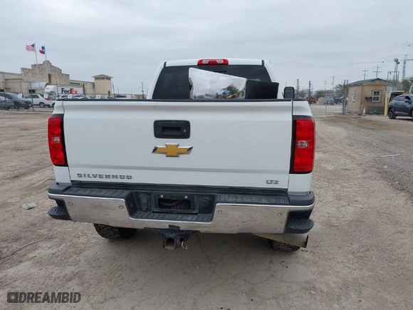 2015 Chevrolet Silverado 2500HD LTZ with VIN 1GC1KWE89FF149299, listed as a IAAI auction lot 41565330 with 249,551 mi miles. Bid and sale history available at carsss.com. Image 17.